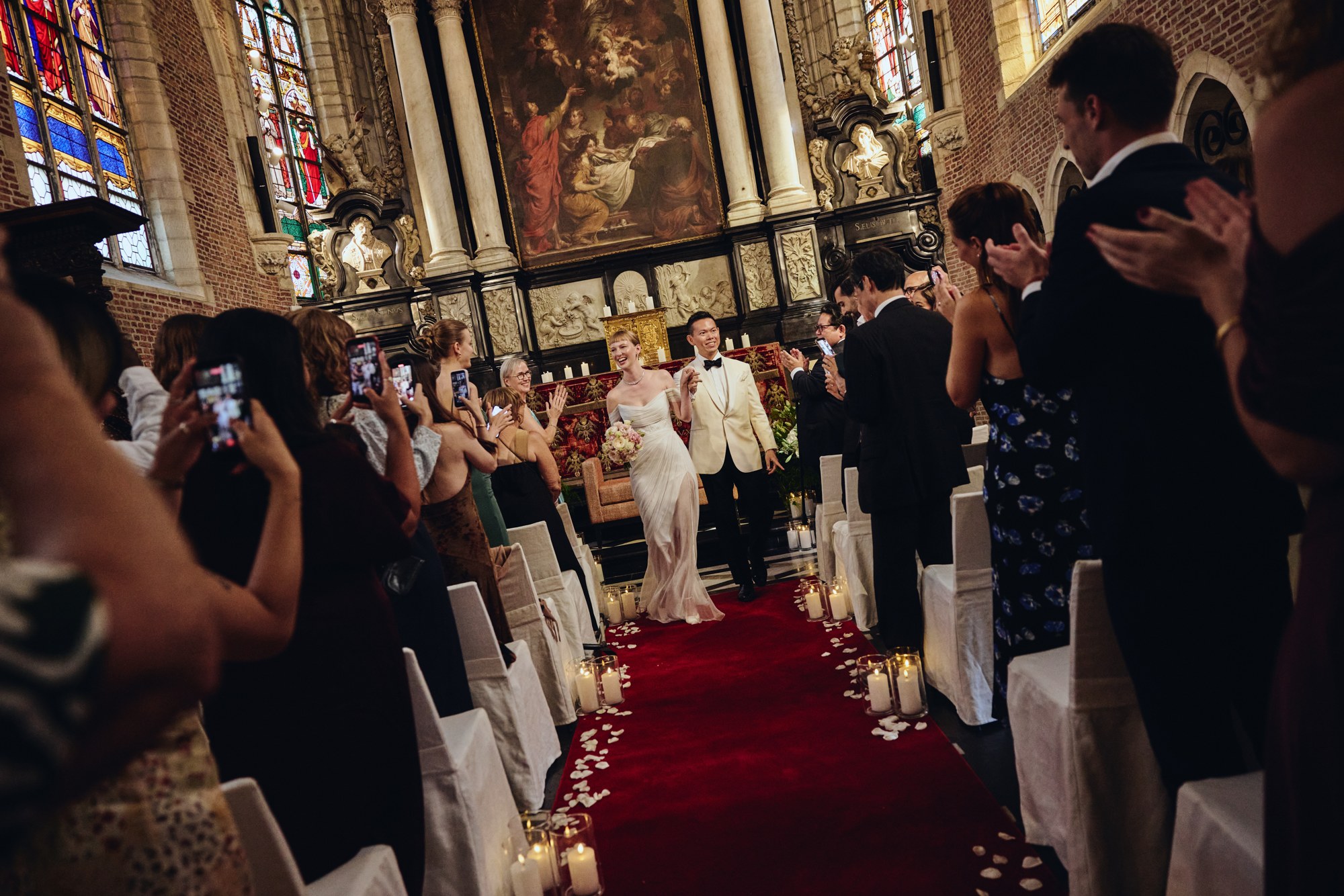 Lina and Jin walking down the aisle together